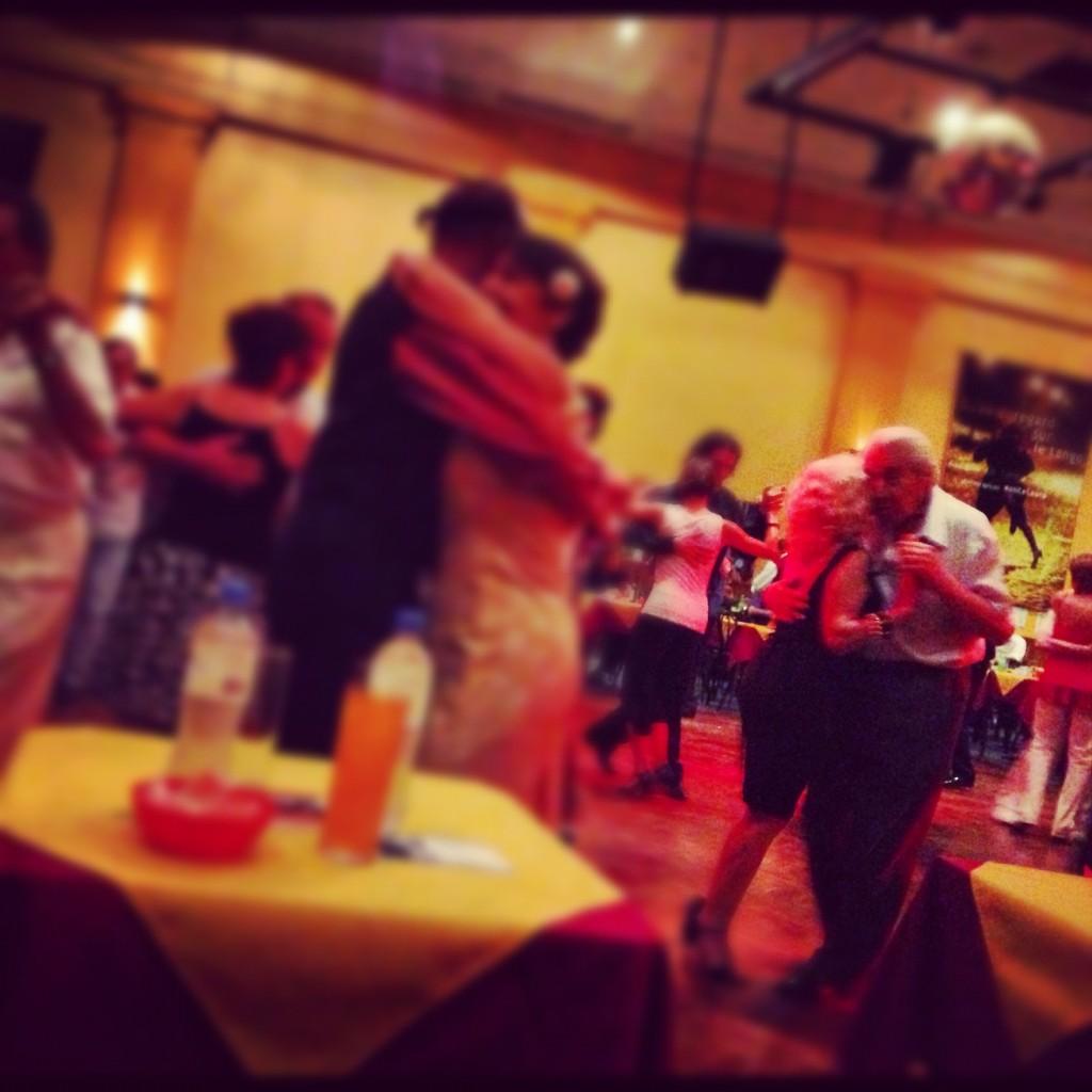 Tango dancing at a local milonga